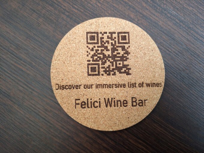 Personalised drink's coaster with QR code and company logo