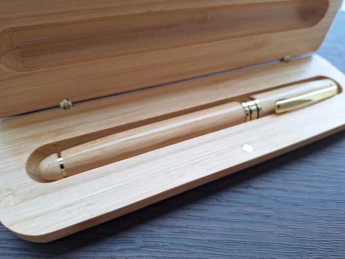 Bamboo pen inside a pen box