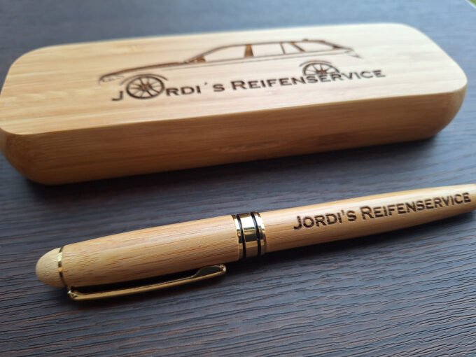 Bamboo pen box and pen with company logo laser engraved onto them