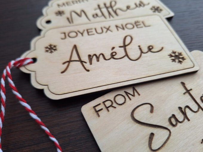 Personalised Christmas gift tags with individuals names engraved