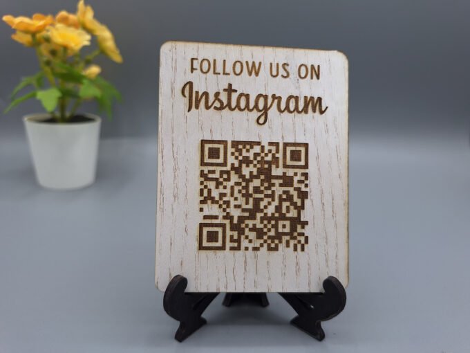 White wood effect design QR code sign with link to Instagram