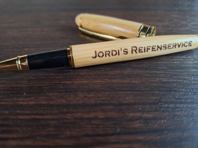 Pen with engraving of company logo